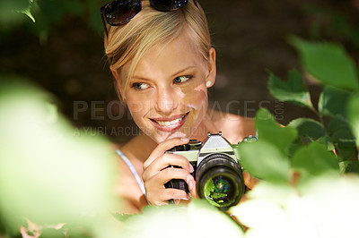Buy stock photo Smile, photographer and nature with woman in forest for trees, environment and relax. Shooting, camera lens and photography with face of female person in woods for travel, torusim and summer
