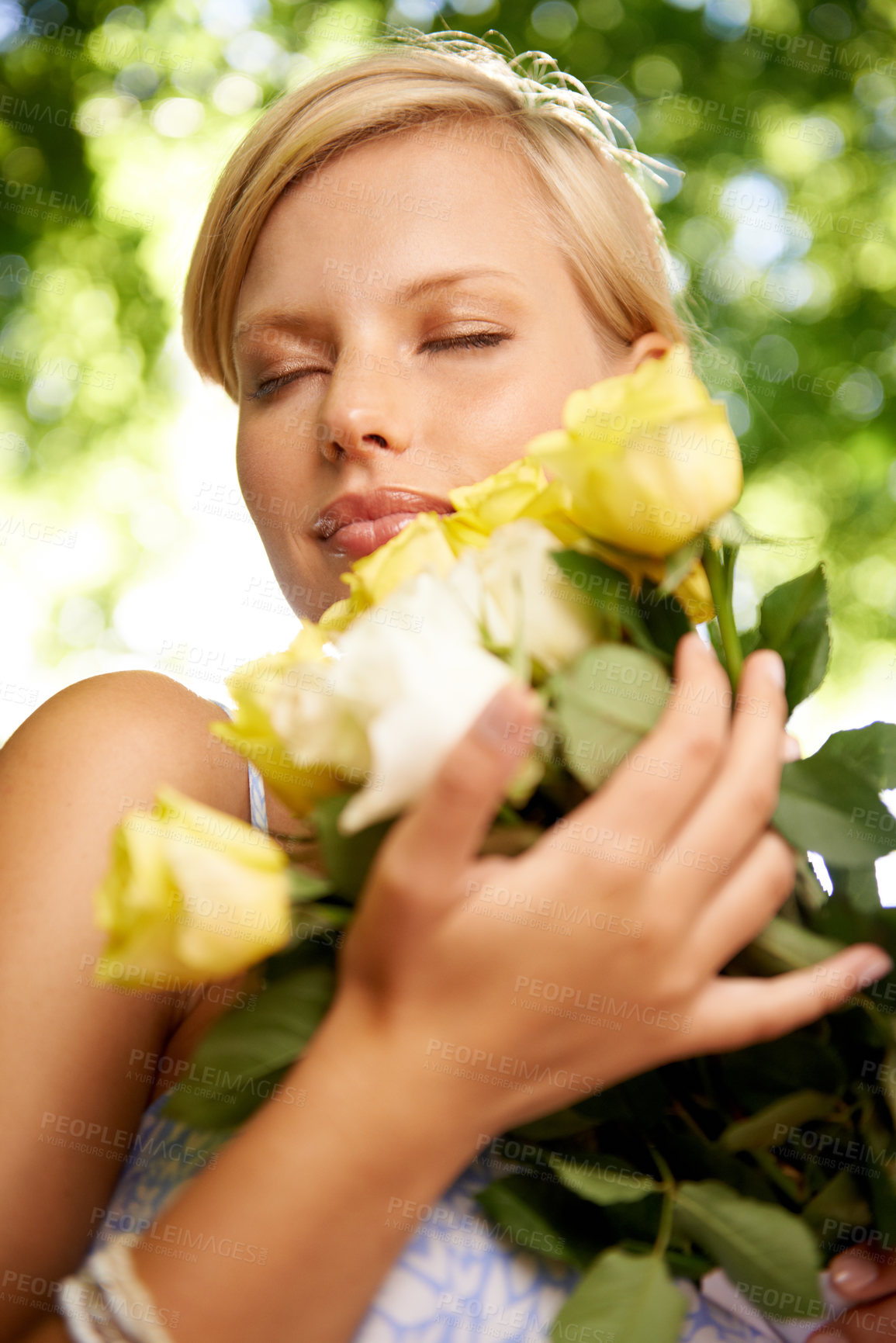 Buy stock photo Relax, nature and woman in garden with roses in bouquet for holiday in spring on outdoor picnic. Smile, trees and face of girl in park with flowers for countryside weekend with sunshine on vacation