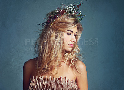 Buy stock photo Woman, beauty and thinking with crown in hair, artistic model or fashion accessory for spring. Young person, designer head piece and beautiful for mythology or fairy character and stylish elegant 