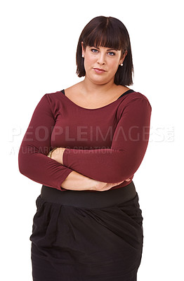Buy stock photo Woman, portrait and serious brunette standing with arms crossed in formal fashion on a white studio background. Face of confident female person or plus size model posing in career or creative startup