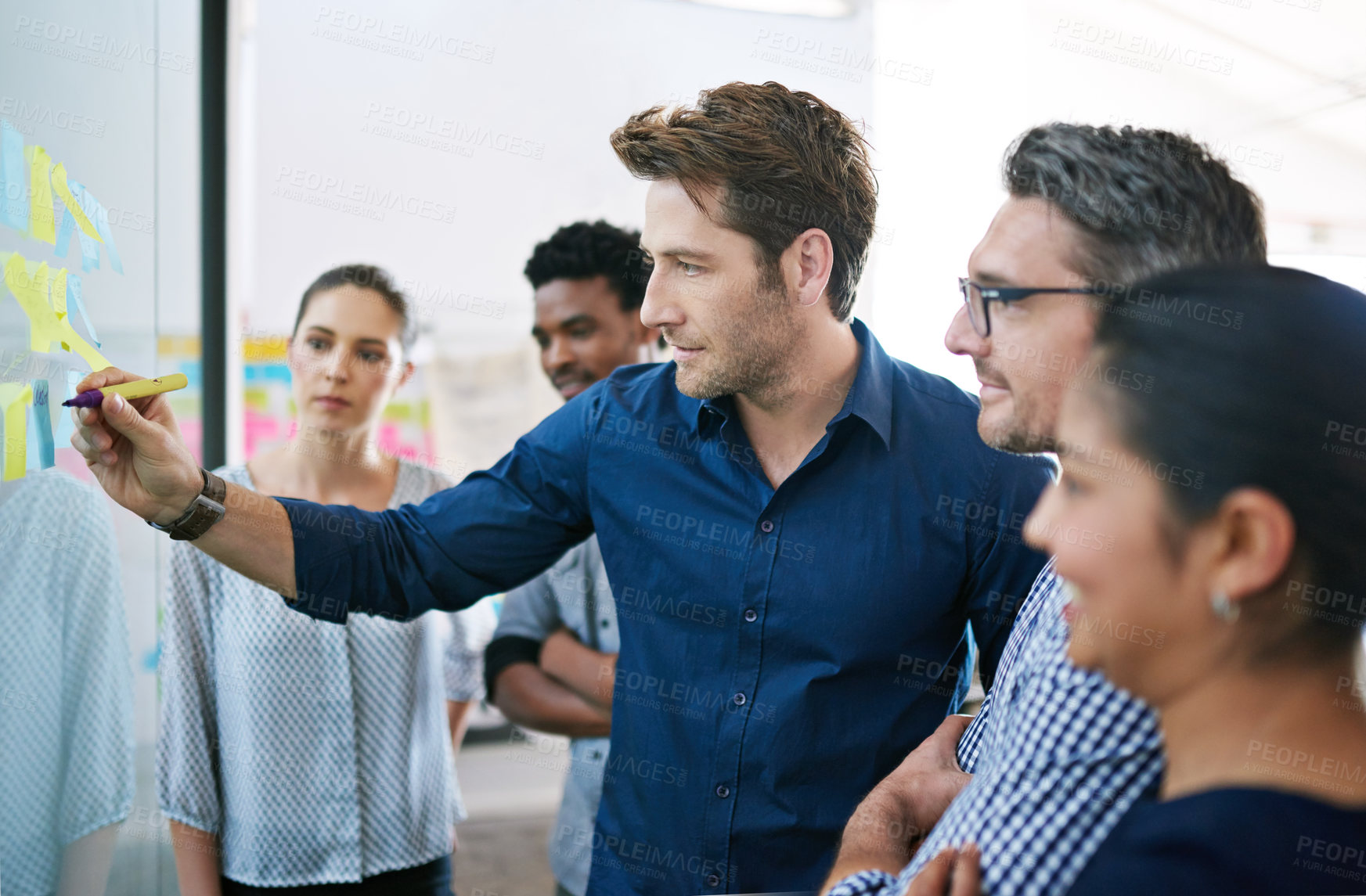 Buy stock photo Shot of a business meeting on the go