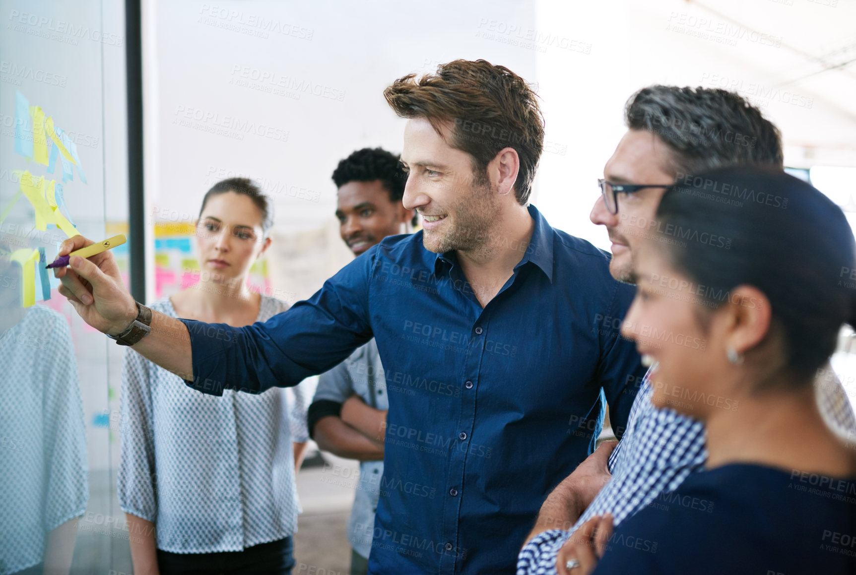 Buy stock photo Shot of a business meeting on the go