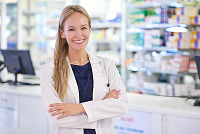 Buy stock photo Portrait of an attractive pharmacist at work