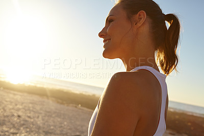 Buy stock photo Profile shot of a beautiful woman in sportswear admiring the view