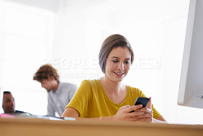 Buy stock photo Happy woman, phone and typing at office for social media, communication or networking by computer. Female person or creative employee on mobile smartphone for online chatting, texting or startup