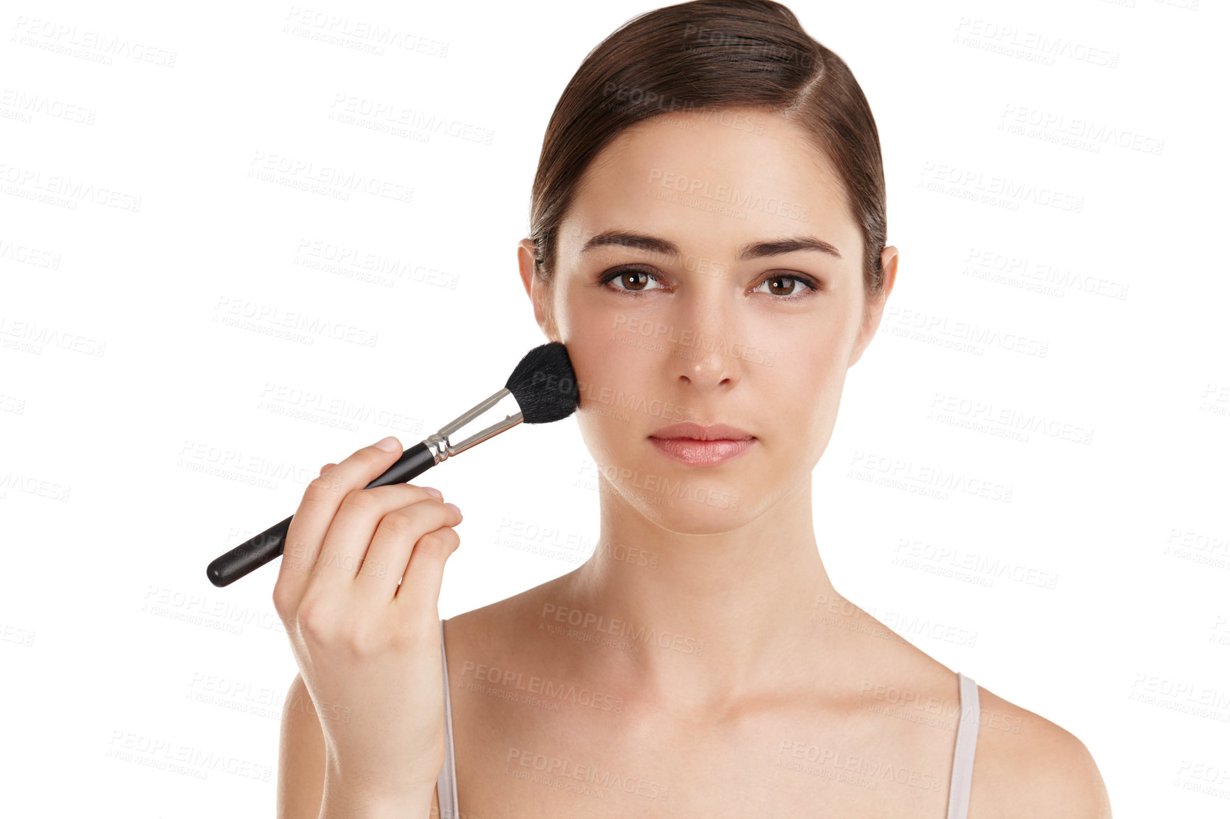 Buy stock photo Cropped portrait of a beautiful young woman applying blusher against a white background