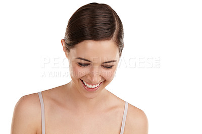 Buy stock photo Cropped shot of a beautiful young woman laughing against a white background