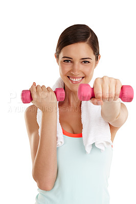 Buy stock photo Shot of a fit  young woman working out with dumbbels