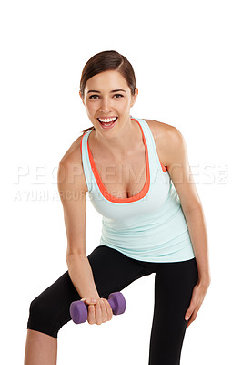 Buy stock photo Shot of a fit  young woman working out with dumbbels