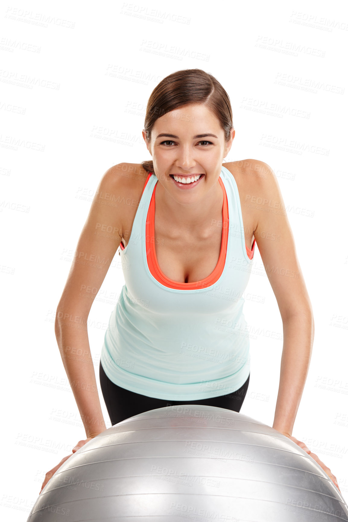 Buy stock photo Shot of a fit  young woman exercising with her exercise ball isolated on white