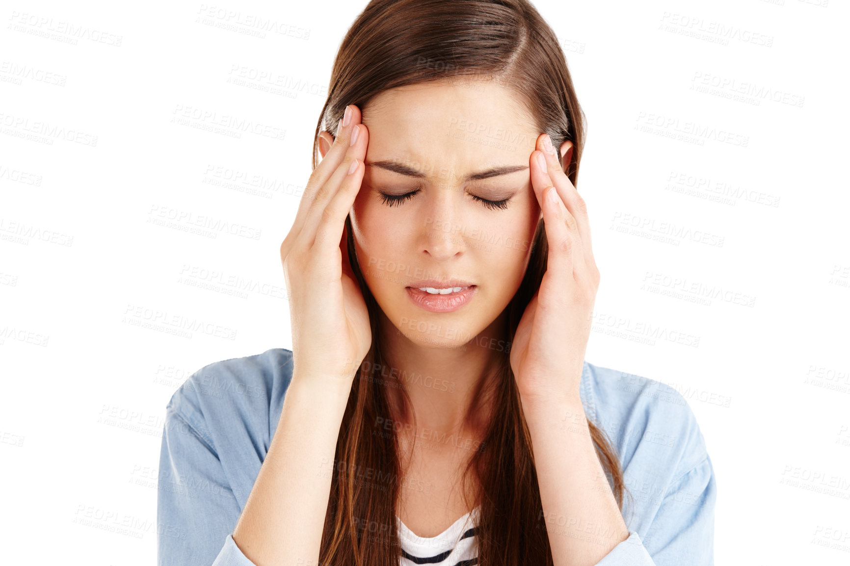 Buy stock photo Studio shot of an attractive young woman suffering from a headache against a white background