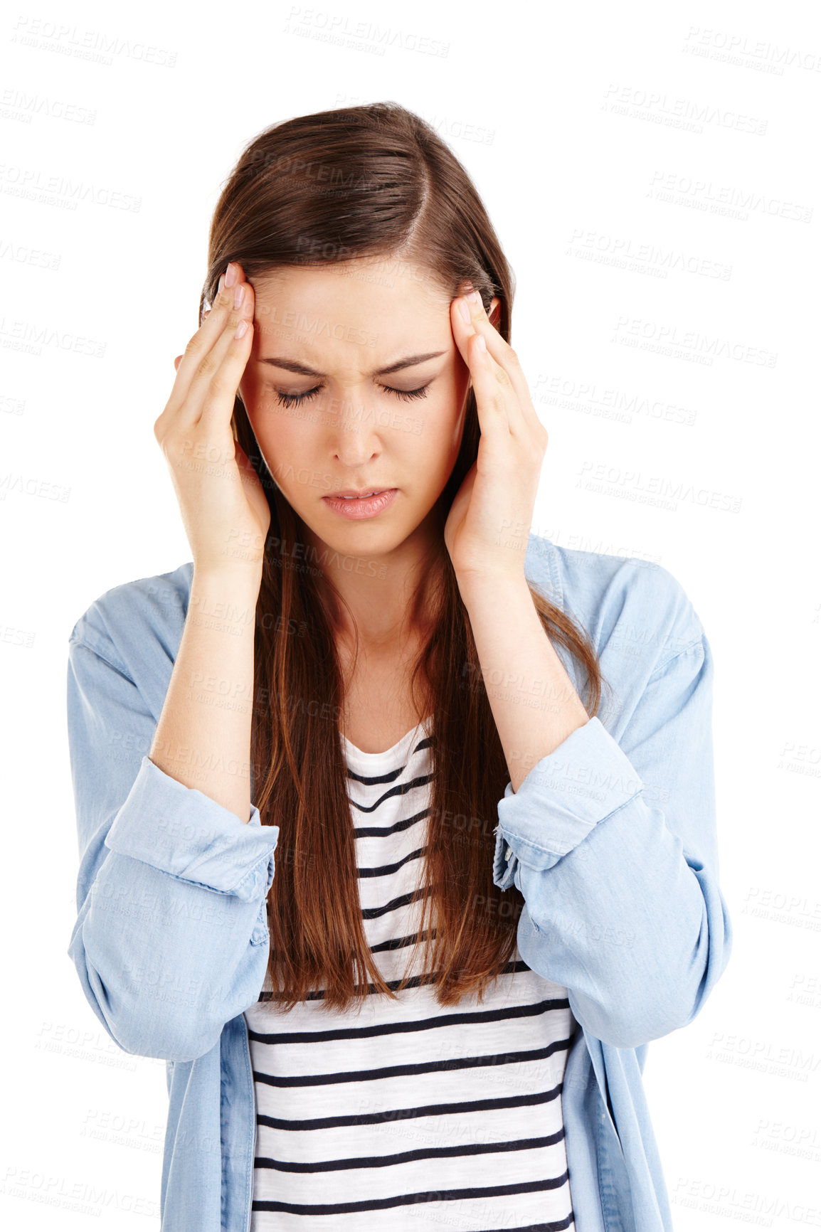 Buy stock photo Studio shot of an attractive young woman suffering from a headache against a white background