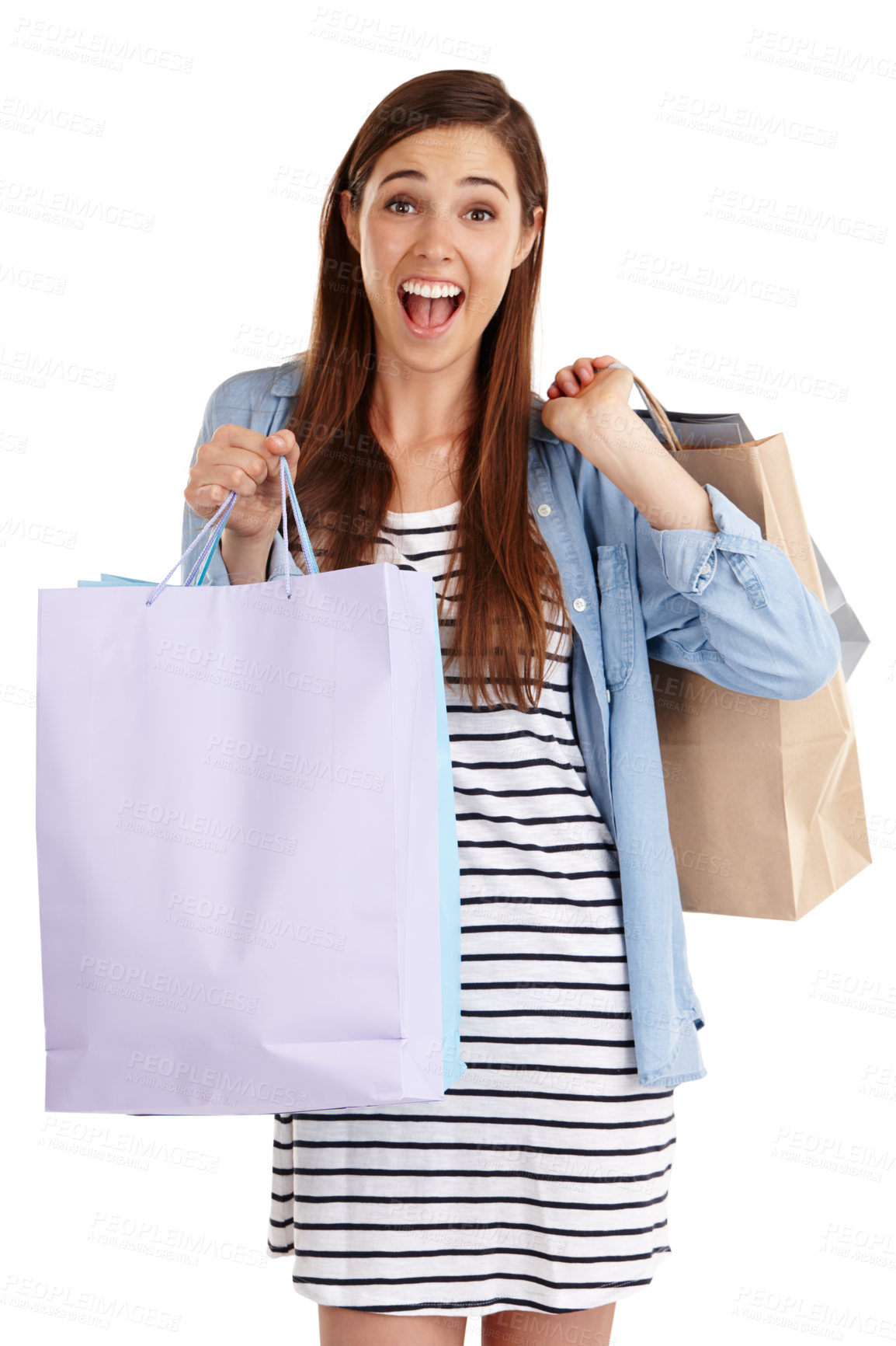 Buy stock photo Studio shot of a beautiful young woman holding shopping bags against a white background 