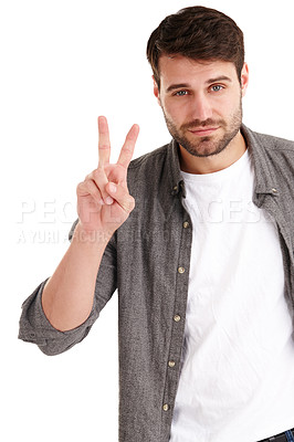 Buy stock photo Studio shot of a young man showing you a peace sign