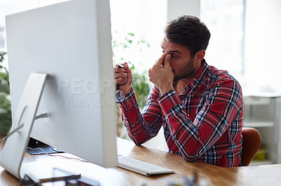 Buy stock photo Shot of an overworked young designer looking exhausted