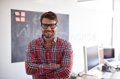 Buy stock photo Portrait shot of a creative professional smiling confidently in his office