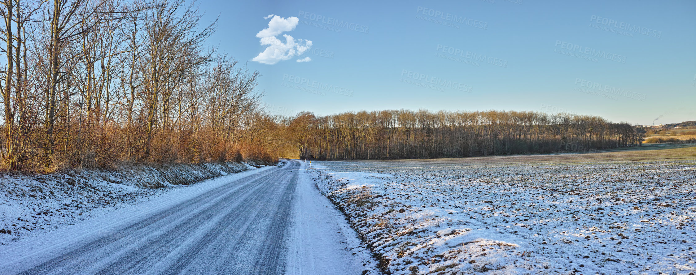 Buy stock photo Winter, countryside and road for travel in snow with nature, forest and blue sky background. Postcard, wallpaper or calendar art for travel, vacation and cold holiday season with street and landscape