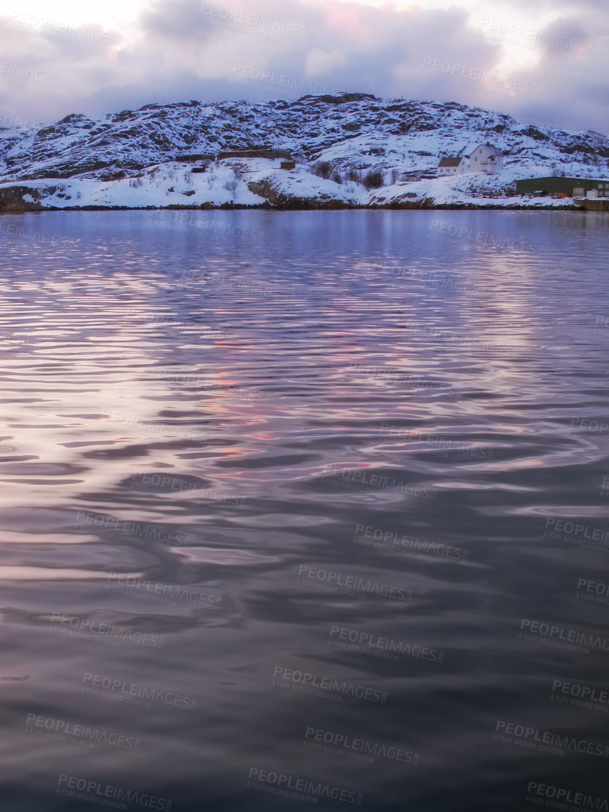 Buy stock photo Copyspace of a calm sunset north of the Polar Circle on a calm winter's day. Quiet Portage Lake with snow capped mountains on a cold winter day. An iced rural landscape in subzero temperature