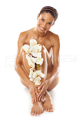 Buy stock photo Portrait, beauty and skincare of woman with flowers in studio on a white background mock up. Floral cosmetics, organic makeup and female model with orchids on legs for skin treatment and body care.