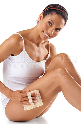 Buy stock photo Woman, portrait and exfoliate legs for beauty, white background and aesthetic wellness. Body care, exfoliation and cleaning for leg cosmetics, massage sponge and healthy skincare, studio and makeup