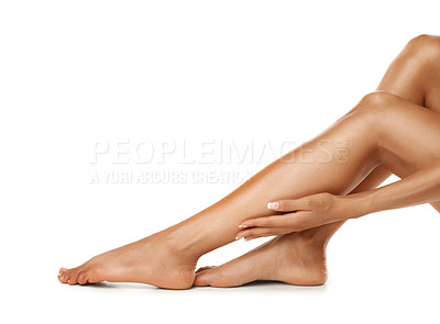 Buy stock photo Beauty, hand and legs with woman in studio for wellness, grooming and self care on white background. Skincare, leg and girl touching soft, smooth and luxury skin after hygiene treatment with mockup 