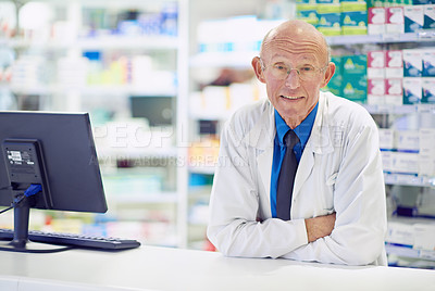 Buy stock photo Portrait of a senior pharmacist working at a counter 