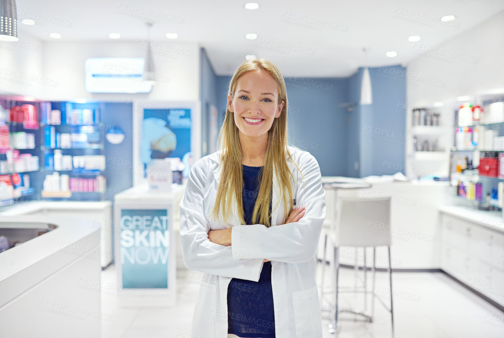 Buy stock photo Portrait of an attractive young woman standing in a cosmetics store