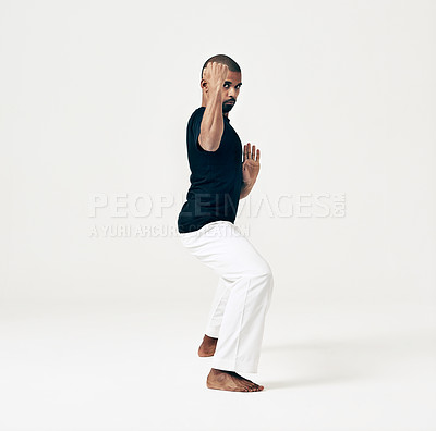 Buy stock photo Karate, punch and man in exercise of martial arts training or challenge with fist on white background. Studio, gym and person with skill in self defence technique or warrior practice action in fight