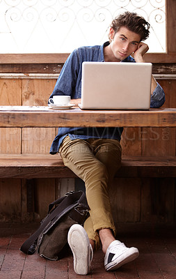 Buy stock photo Laptop, restaurant portrait and man bored online project, customer experience report or editing social media post. Remote work, coffee shop and person tired of working on blog, story or cafe research