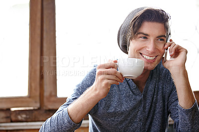 Buy stock photo Young man, phone call and cafe with drink, smile and conversation for networking, talking and good news. College student guy, smartphone and happy chat with tea cup, matcha or espresso in coffee shop