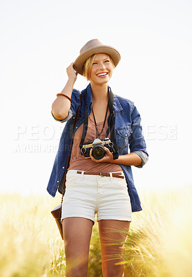 Buy stock photo Nature, photography and woman with a camera, smile and journey with adventure, travel and memory with sunshine. Happy person, countryside or summer with photographer, outdoor and freedom with picture