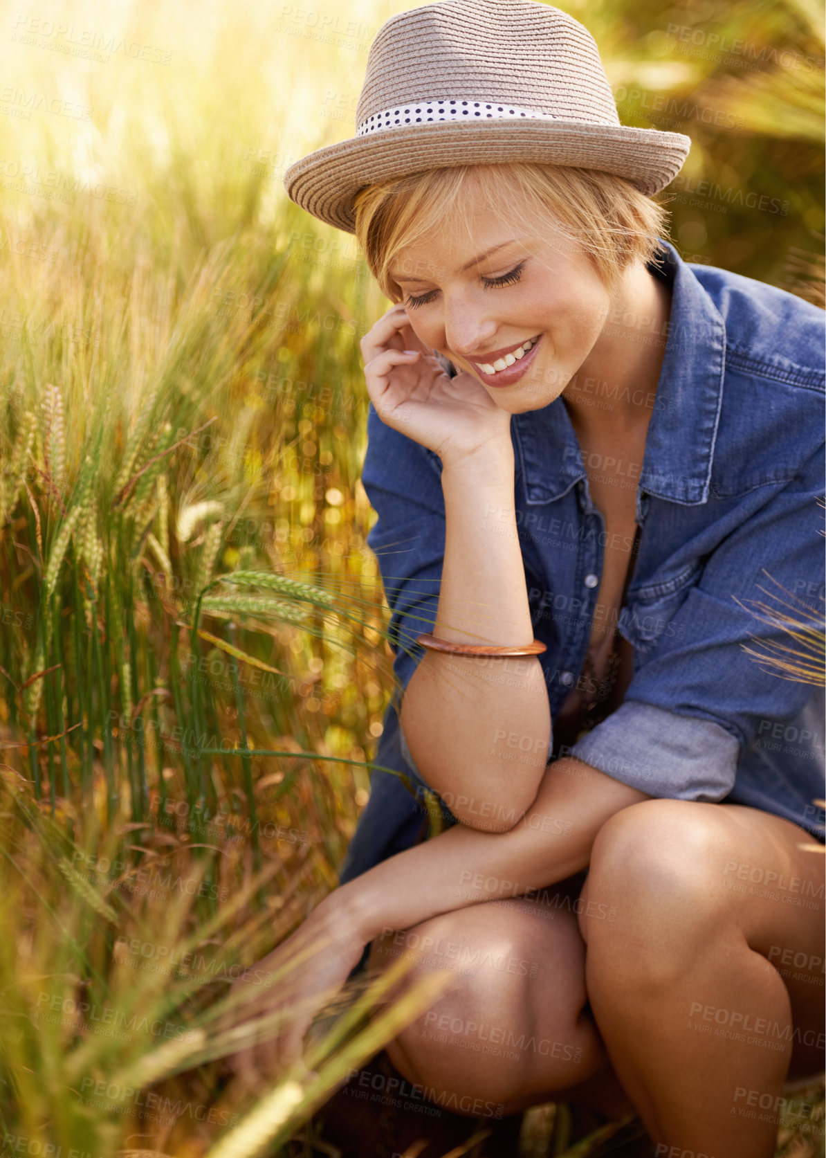 Buy stock photo Field, thinking and woman with sunshine, smile and ideas with tourism, adventure and countryside. Person, travelling and girl with happiness, daydreaming and fantasy with fresh air, relax and journey