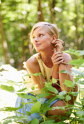 Buy stock photo Woman, garden and plants with thinking, relax and calm outdoor in a forest with smile. Female person, grass and nature in summer with vacation and gardening with green woods with an idea in the sun