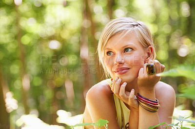 Buy stock photo Woman, woods and plant with thinking, relax and calm outdoor in a forest with smile. Female person, grass and nature in summer with vacation and holiday with green tree with an idea in the sun