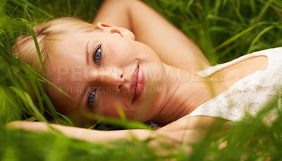 Buy stock photo Grass field, nature portrait and happy woman relax, smile or leisure for outdoor stress relief, wellness or park break. Freedom, spring face or forest girl enjoy fresh air, sunshine or rest on ground