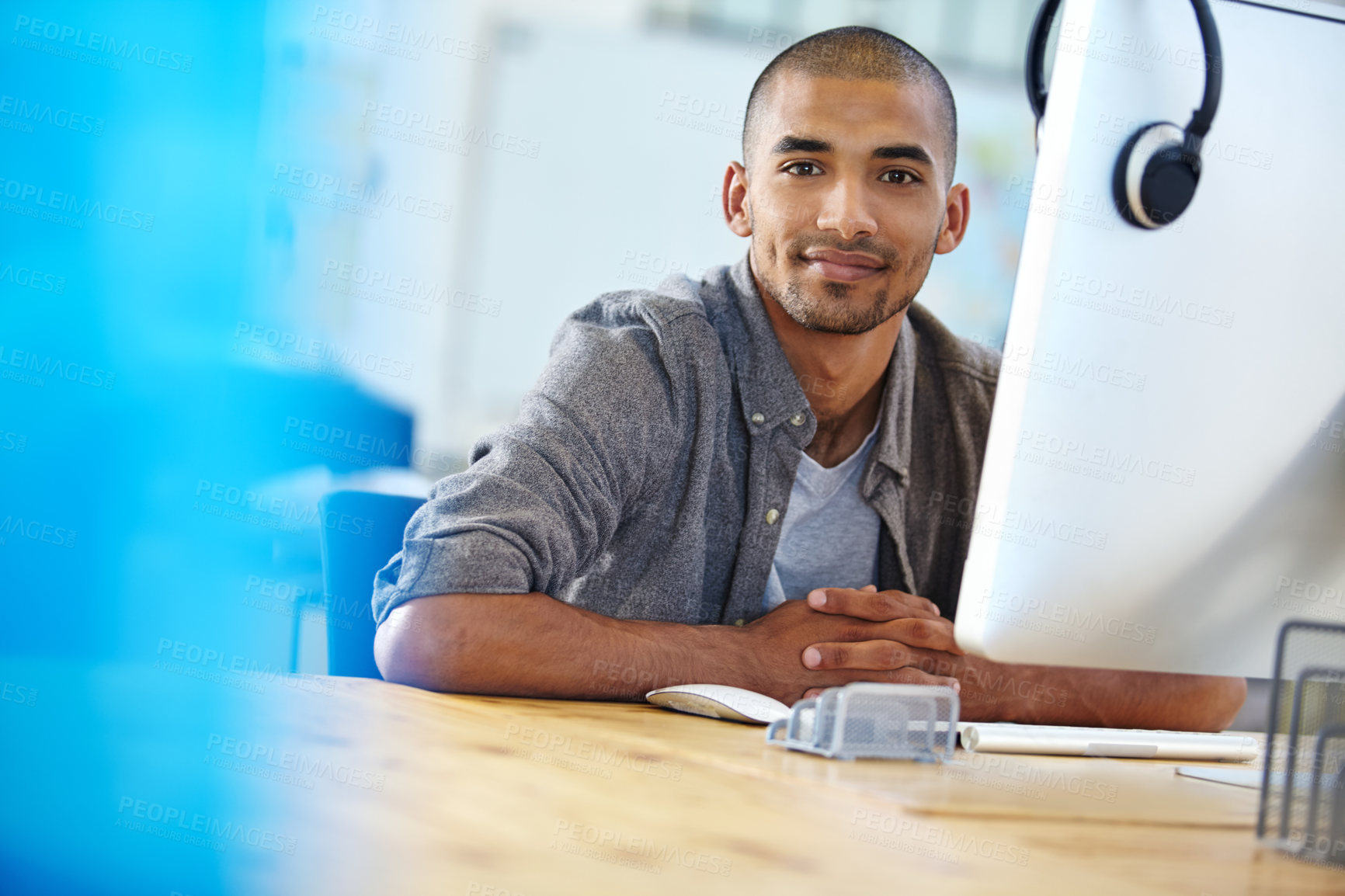 Buy stock photo Portrait of a designer at work on a computer in an office