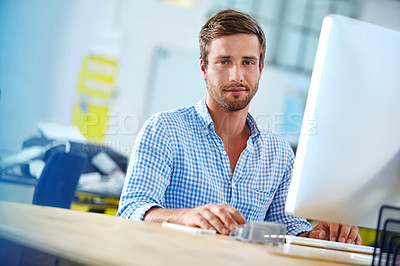 Buy stock photo Portrait of a designer at work on a computer in an office