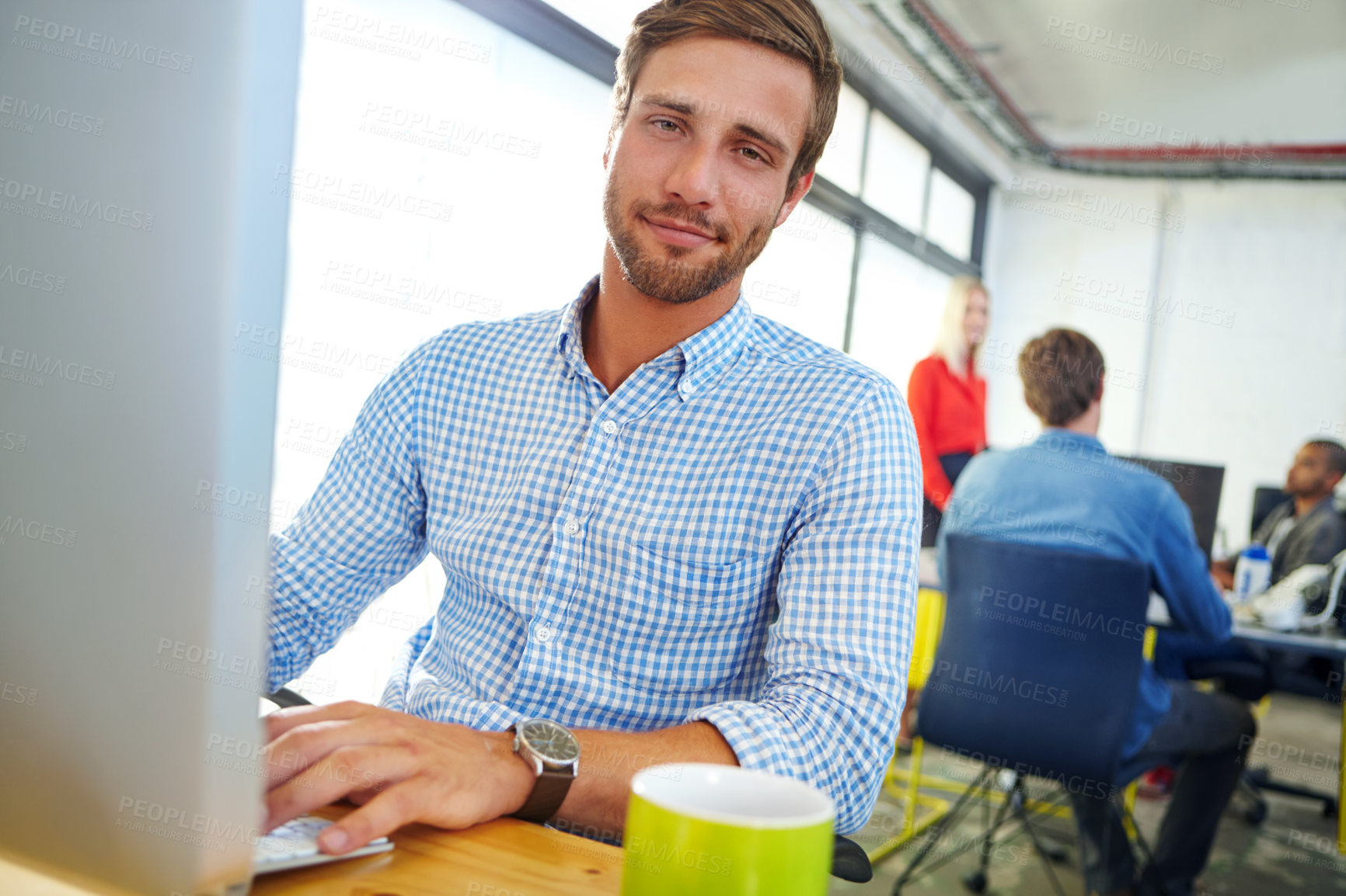 Buy stock photo Portrait of a designer at work on a computer in an office