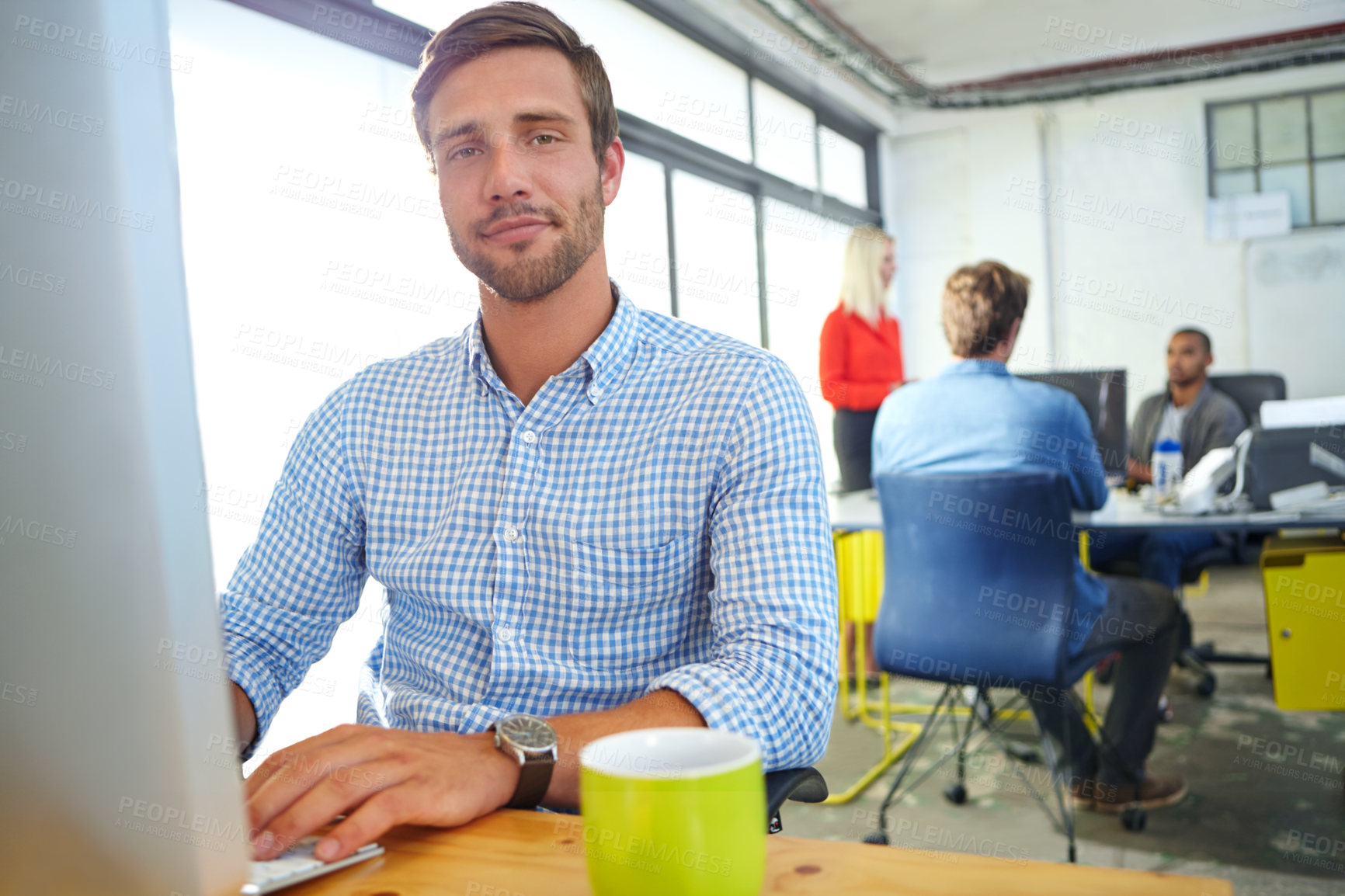 Buy stock photo Portrait of a designer at work on a computer in an office