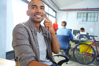 Buy stock photo Shot of a young designer at work in an office