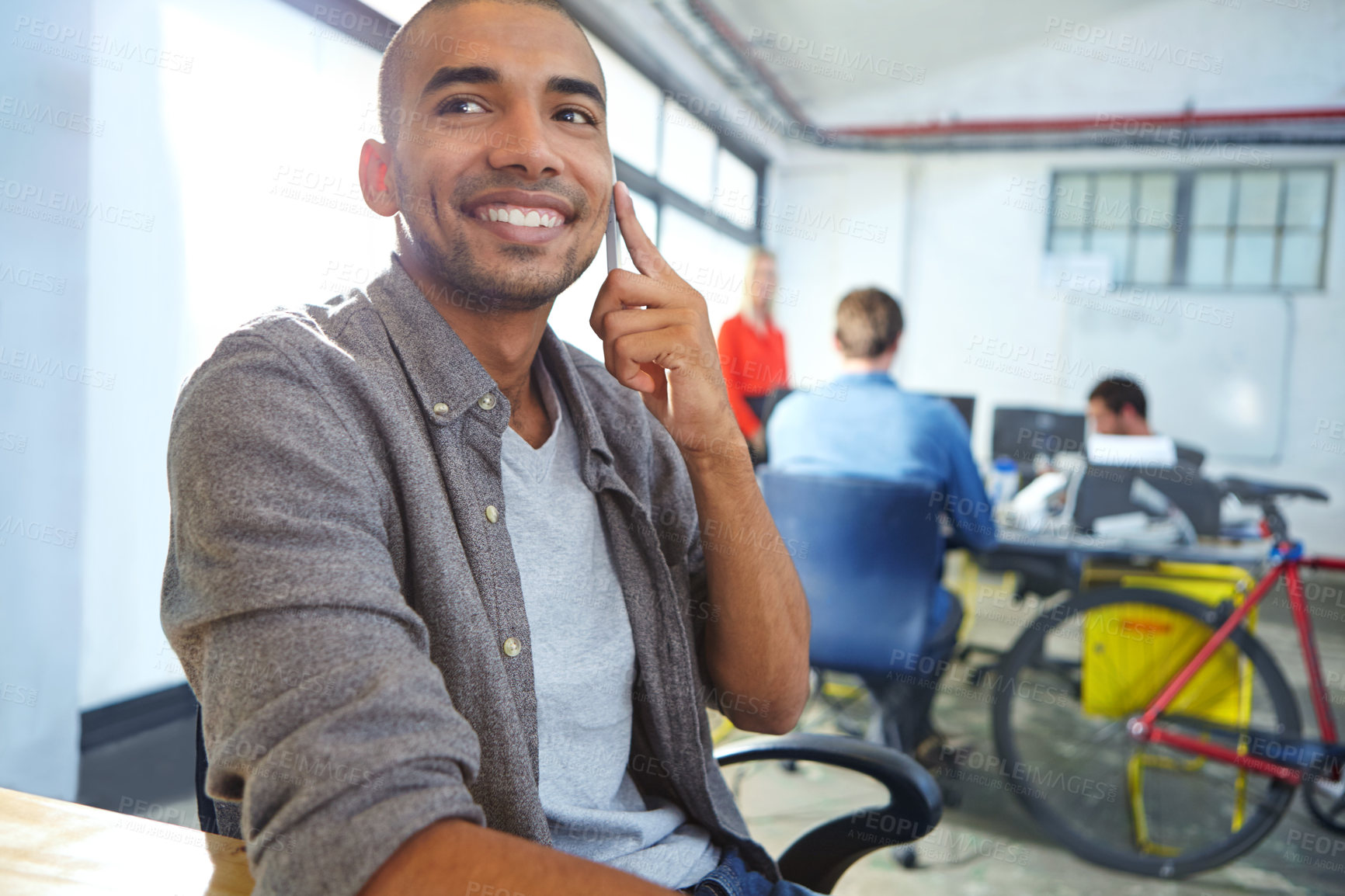 Buy stock photo Shot of a young designer at work in an office