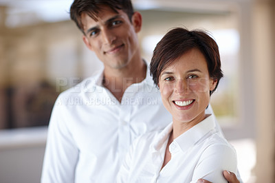 Buy stock photo Couple, happy and portrait in office with woman, man and hug with relationship at startup company. People, partnership and smile with team, support and love in workplace at small business in Italy