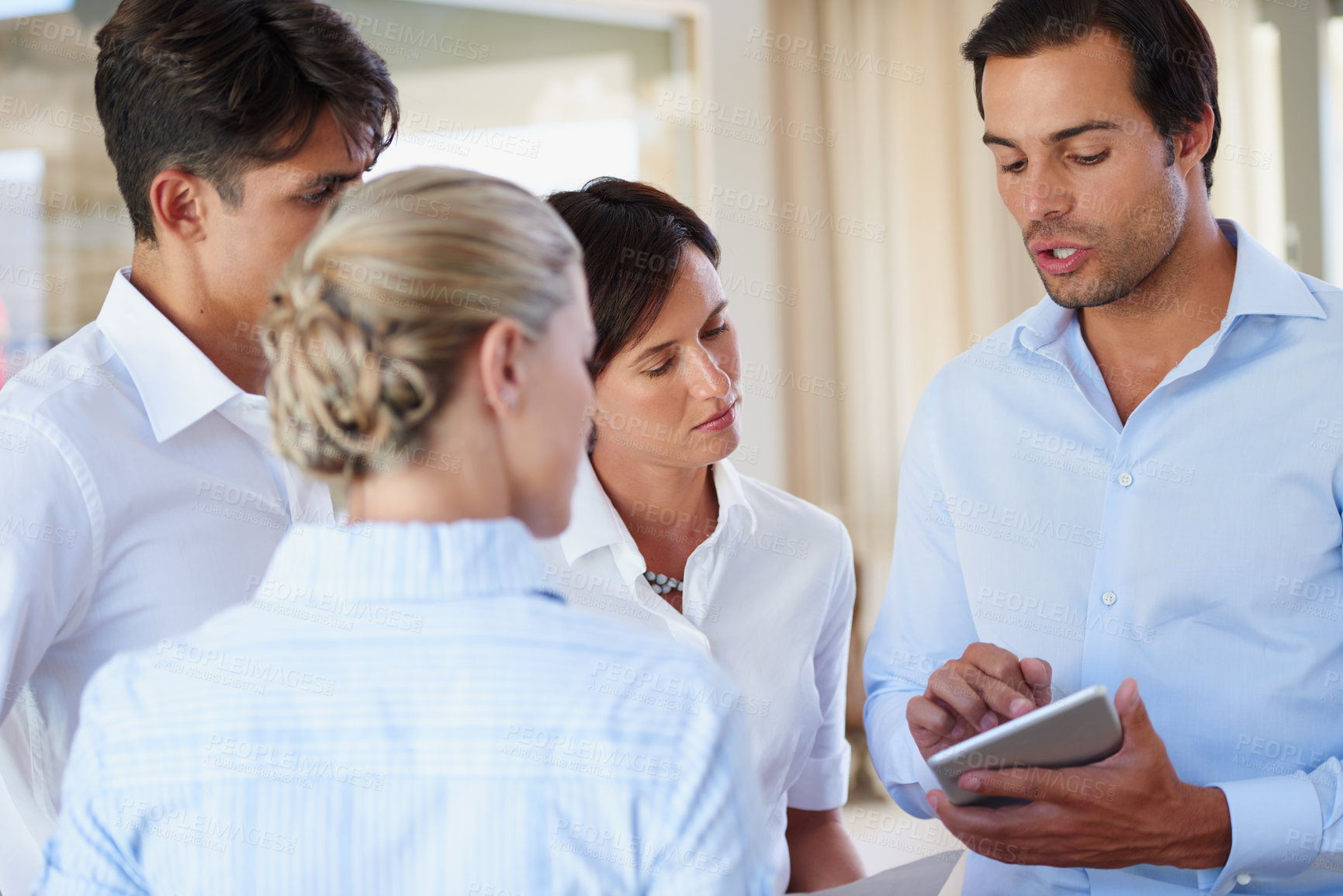 Buy stock photo Hotel, training and manager with team on tablet for meeting, website information and support. Hospitality, front desk and people on digital tech for bookings, guest room service and reservation help