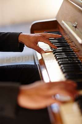 Buy stock photo Closeup shot of the hands of a man playing the piano