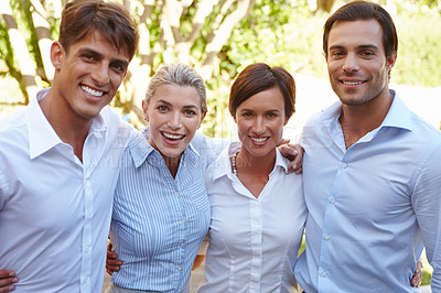 Buy stock photo Shot of a group of happy colleagues on a business retreat