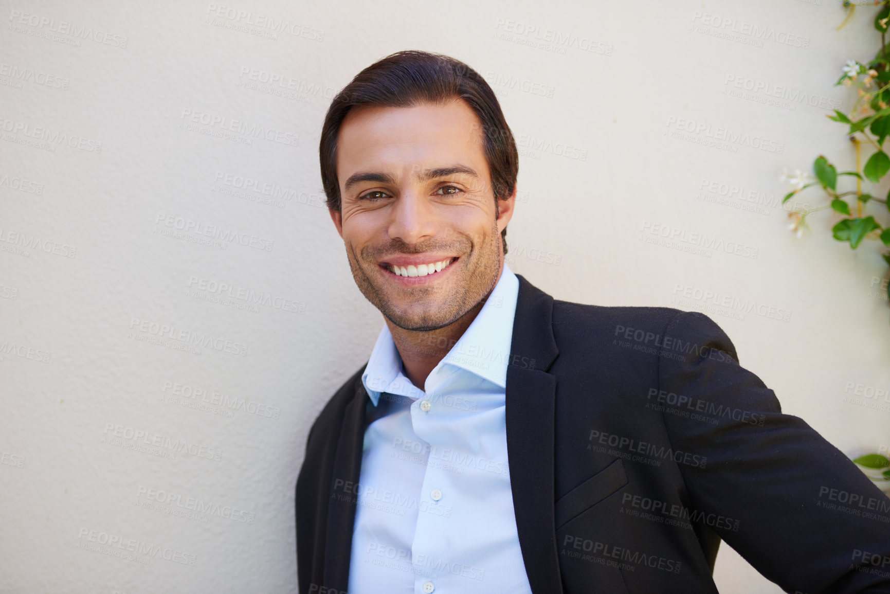 Buy stock photo Portrait of a handsome and well-dressed businessman standing outside