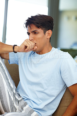 Buy stock photo Cropped shot of a young man coughing