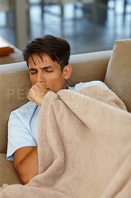 Buy stock photo Cropped shot of a young man coughing