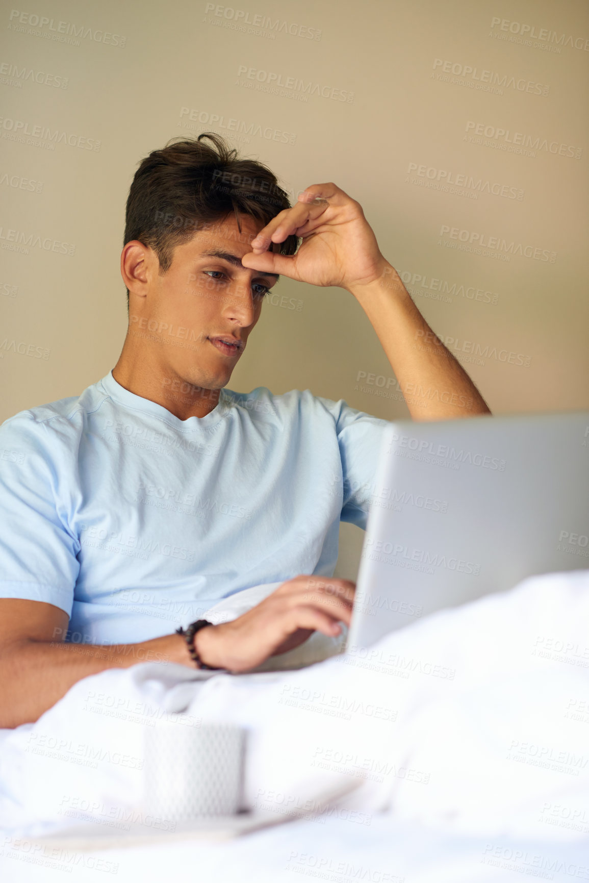 Buy stock photo Man, stress and bed on laptop at house of journalism remote work, reading blog and editing mistake. Male writer, typing and online research for novel writing, copywriting report and proposal deadline