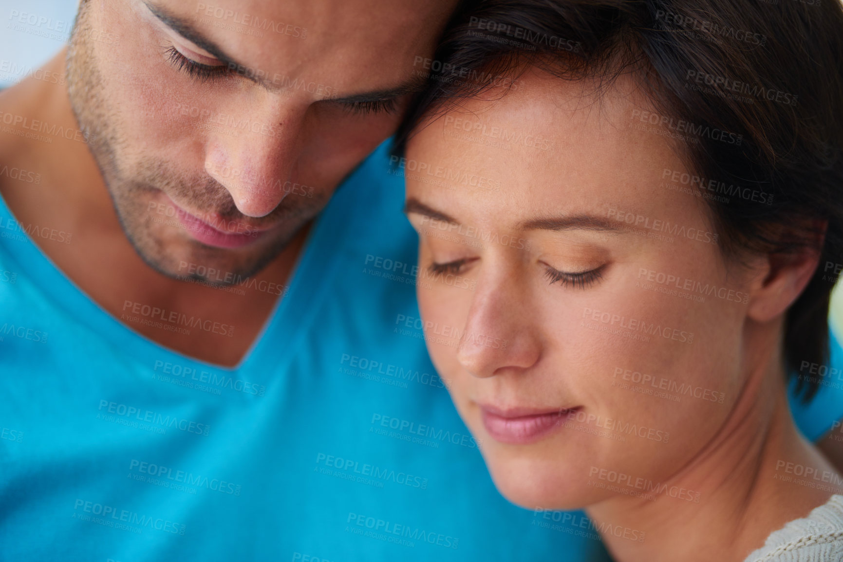Buy stock photo Love, couple and forehead touch for support, care and bonding together for commitment to serious relationship. Man, woman and comfort partner in marriage, romantic connection and loyalty in home